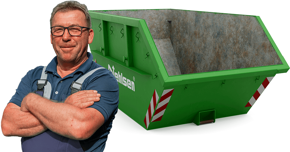 Handwerker mit blauem Arbeitsanzug steht selbstbewusst vor einem grünen Abfallcontainer der Firma Nehlsen mit rot-weiß reflektierenden Markierungen.